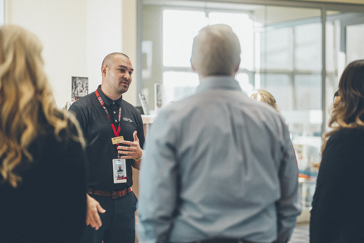 a person talking to a group of people