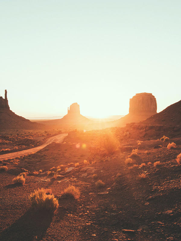 a desert landscape with tall rock formations